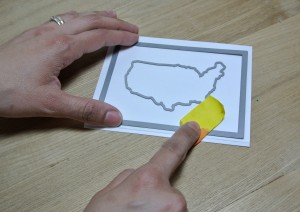 First I die cut the stitched rectangle die and the United States outline map.